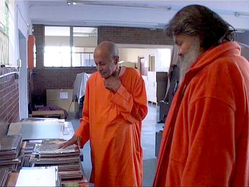 Swamiji Sahajanandji shows Swamiji the printing press room