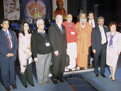 Group photo of some the main guests: Ramu Damodaran, from the United Nations, Chief of the Civil Society Outreach Division, the Ambassador of India to the Slovak Republic, Her Excellency Homai Saha, Sri Gulab Kothari, Dr. Timi Ecimovic, an eminent climate change scientist, researcher and lecturer, His Holiness Mahamandaleshwar Swami Niranjananda Maharaj, His Holiness Vishwaguru Paramhans Swami Maheshwarananda, Ricaardoe Di Done, President of the Organization for the Protection of Children’s Rights, Bawa Jain, Secretary General of the World Council of Religious Leaders at the Millenium World Peace Summit of Religious Leaders, Rev. Tsu-Wei Zoe Chang, President of the United Nations Womens Guild